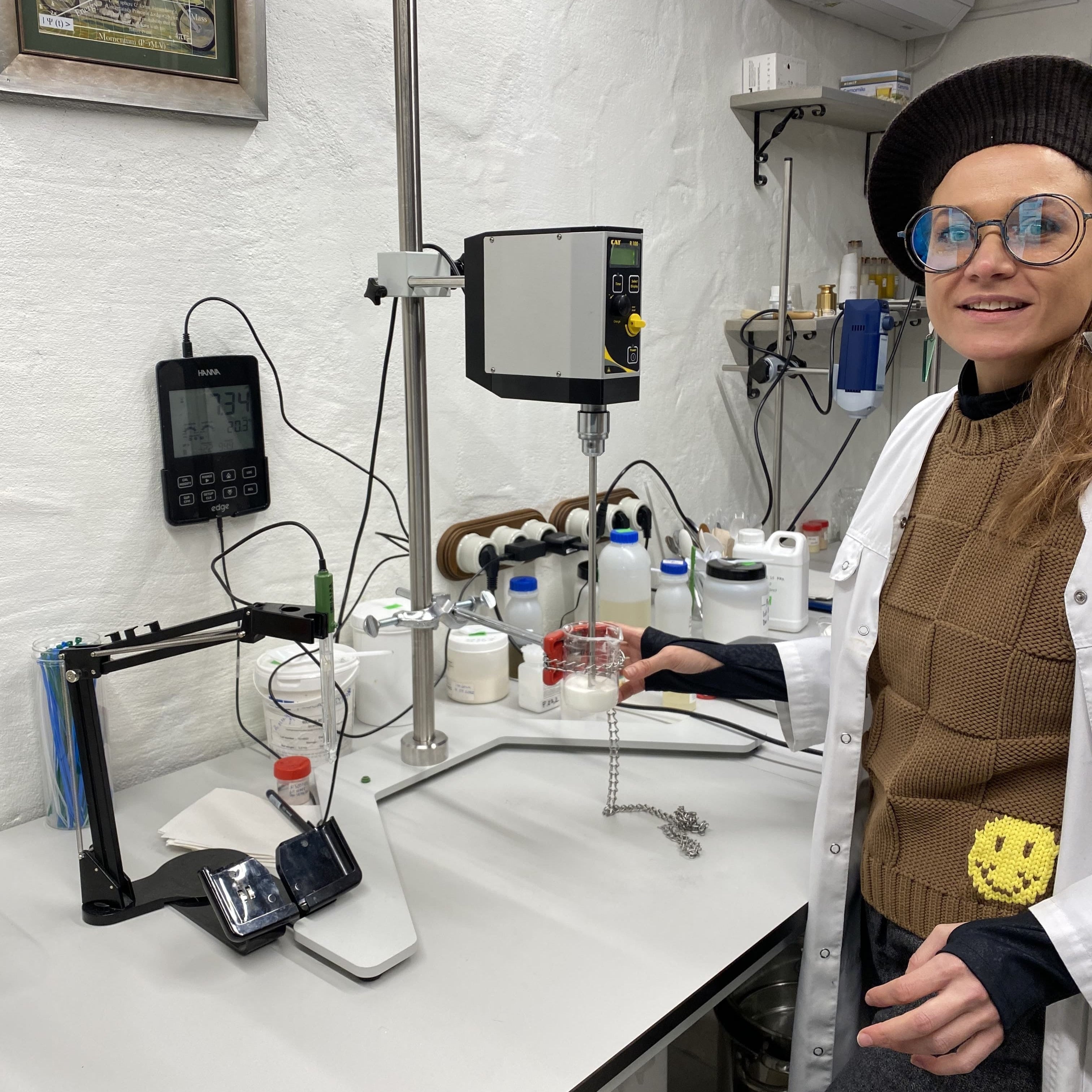 Līga Brūniņa in the laboratory mixing ingredients