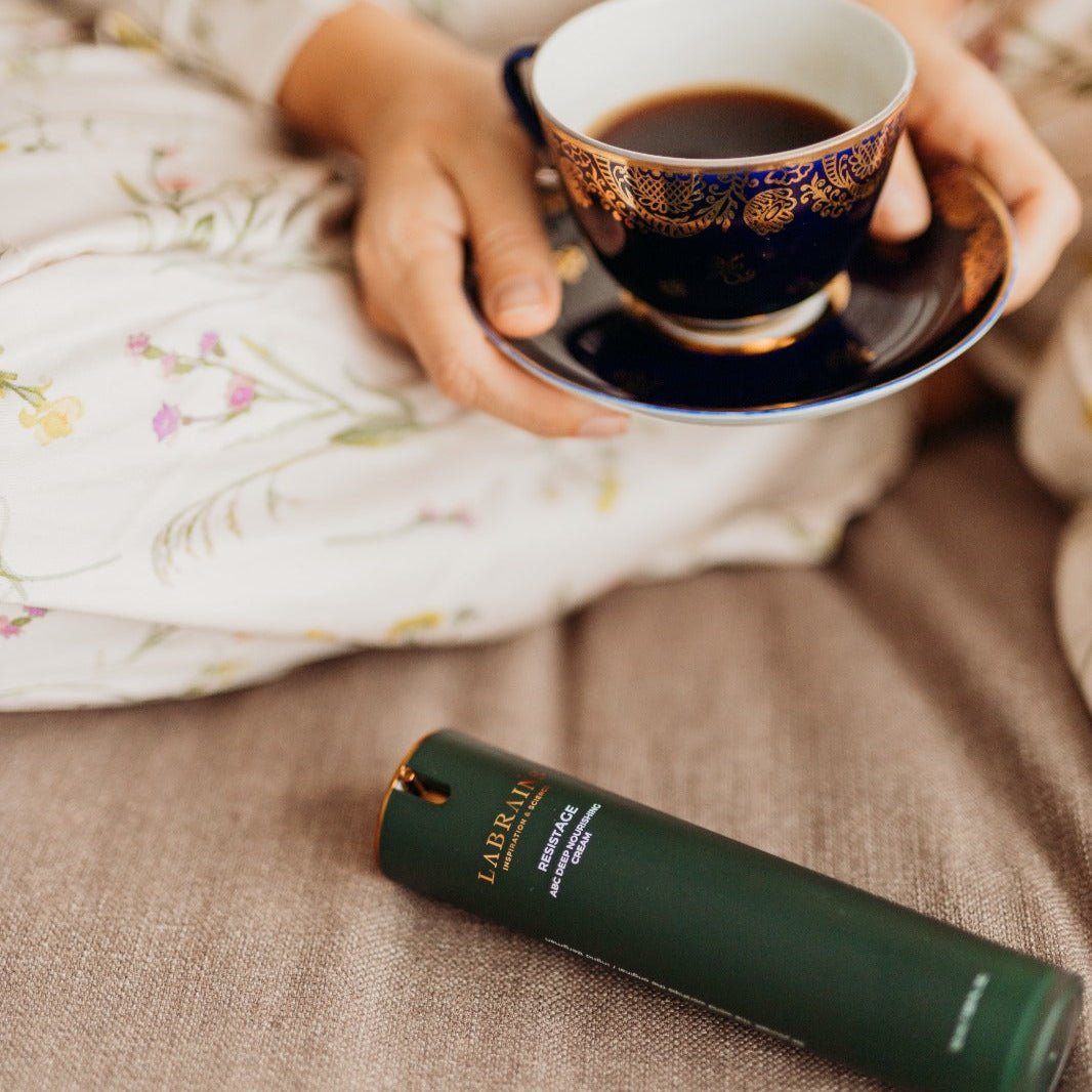 Labrains ABC Deep Nourishing cream with a cup of coffee in background