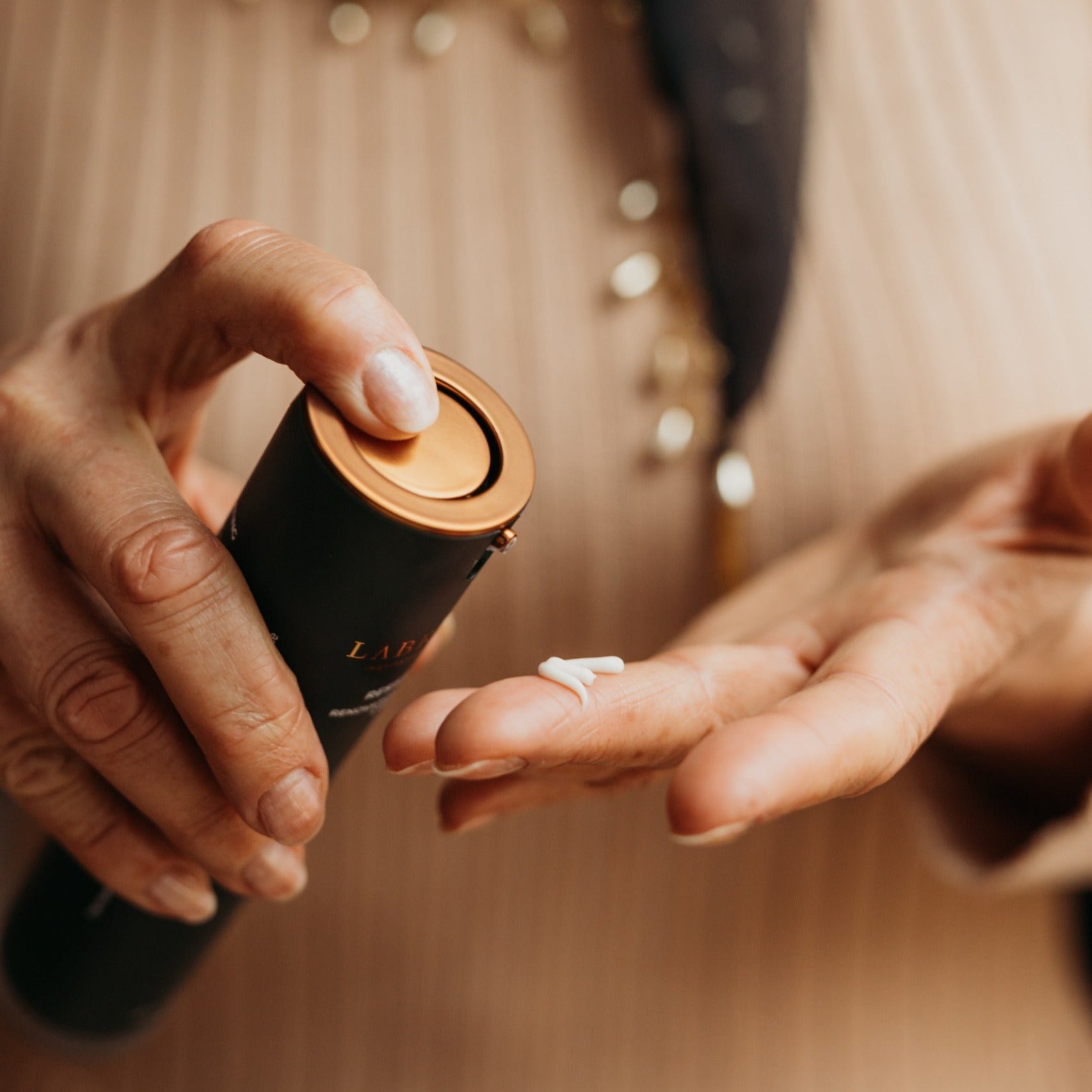 Labrains anti-age cream in woman's hands